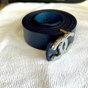 Silver buckle, blue leather belt